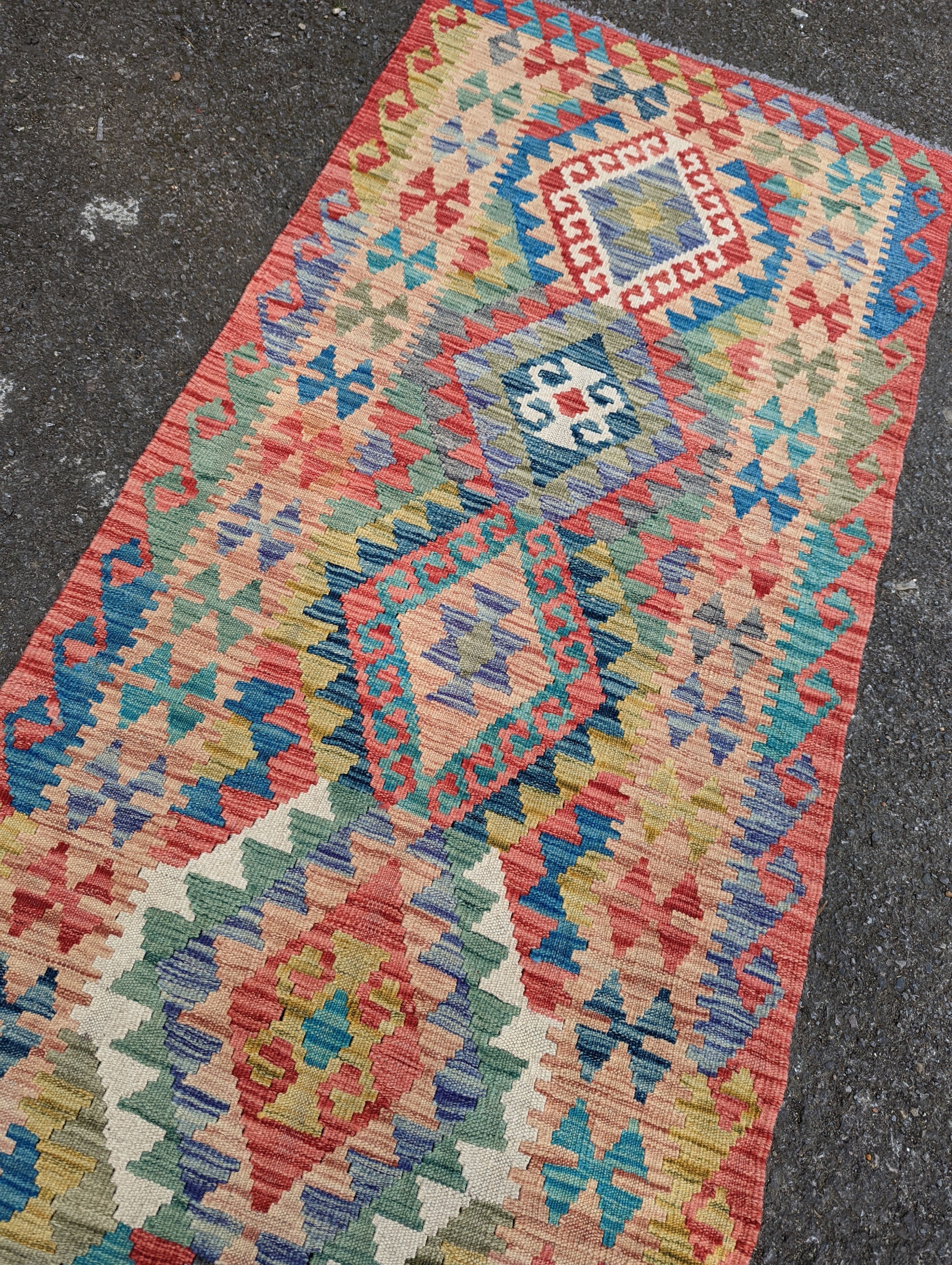 A contemporary Anatolian design Kilim flatweave runner, 290 x 85cm